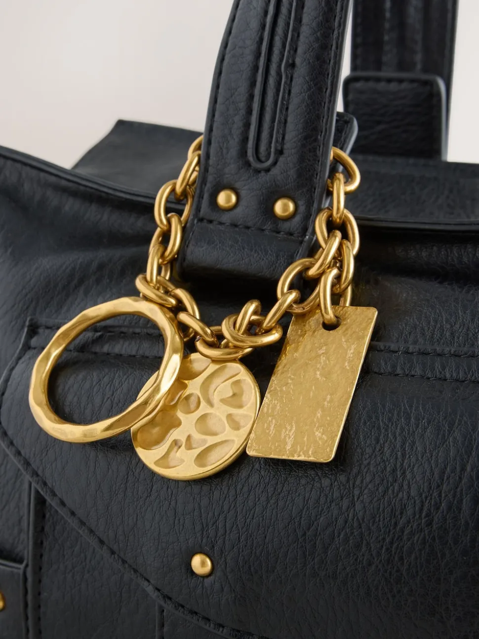Black Charm Buckle Hand Held Bag