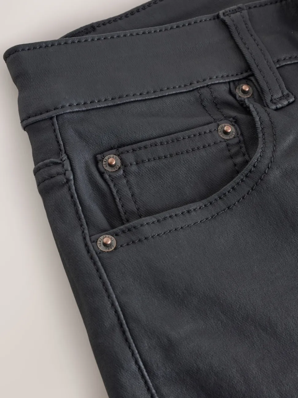 Black Coated Bootcut Jeans