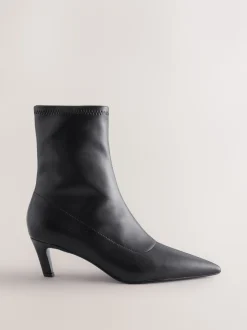 Black Forever Comfort® Pointed Toe Sock Boots