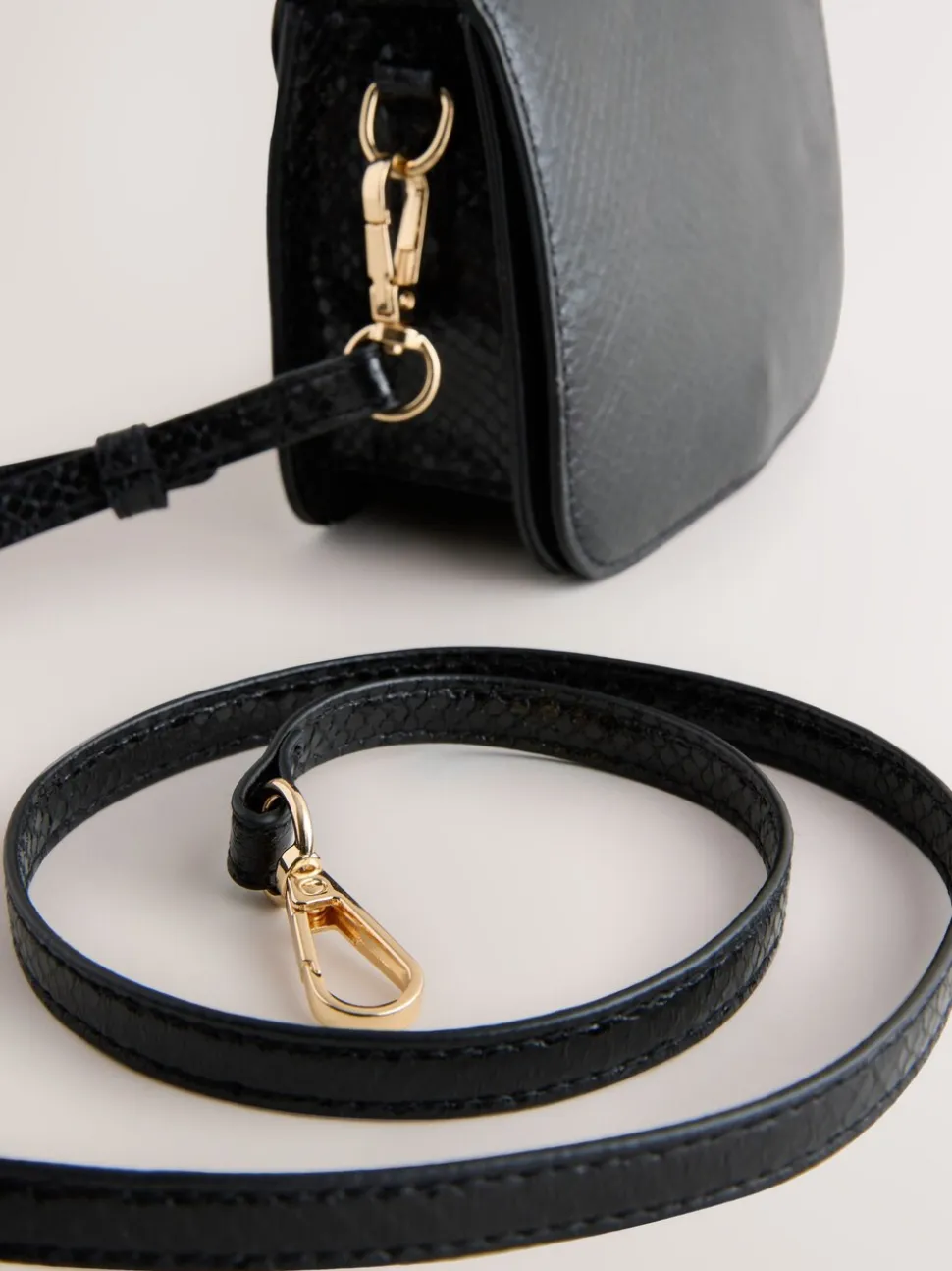 Black Gold Hardware Top Handle Bag