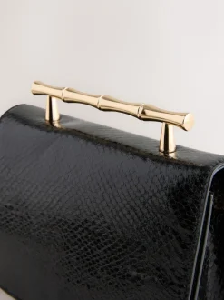 Black Gold Hardware Top Handle Bag