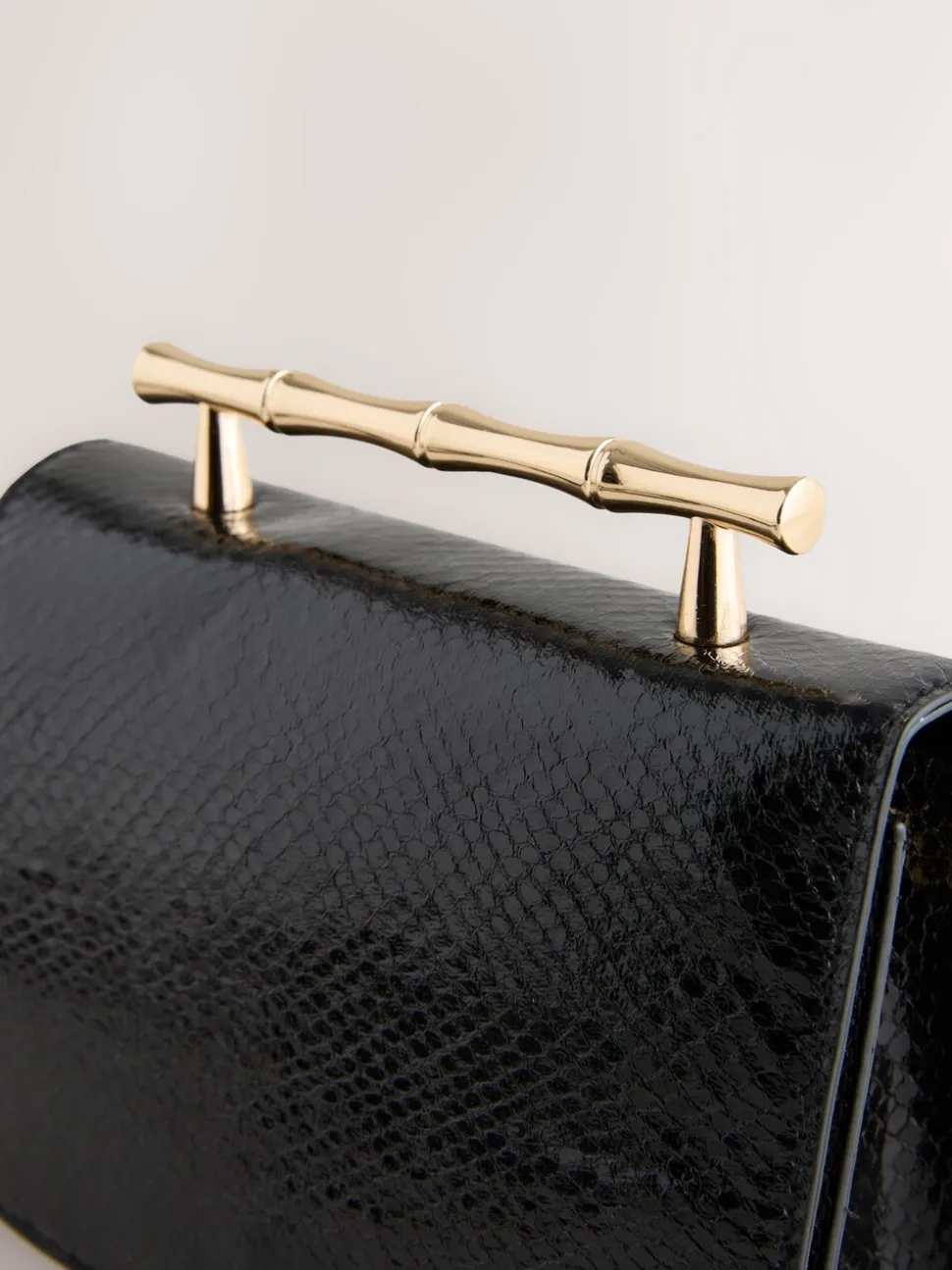 Black Gold Hardware Top Handle Bag