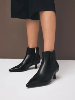 Black Leather Motion Flex Almond Toe Chelsea Style Ankle Boots