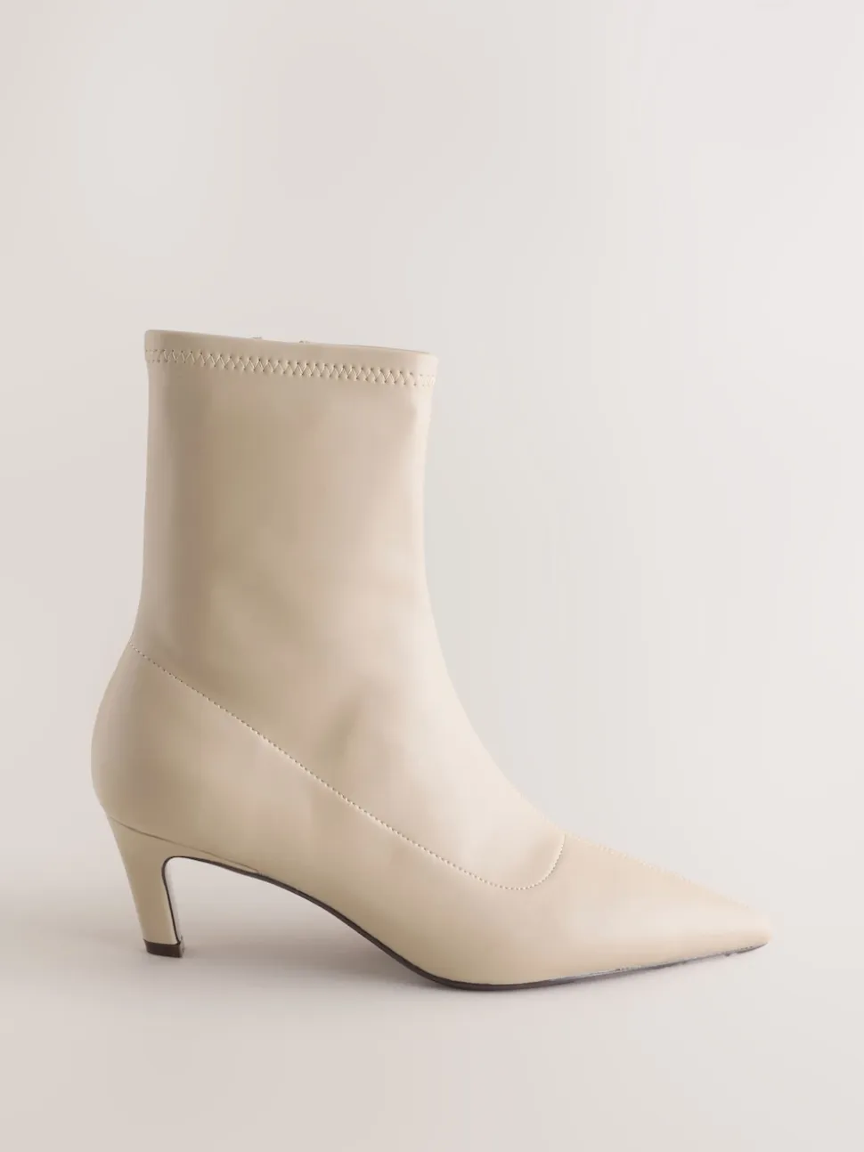 Cream Forever Comfort® Pointed Toe Sock Boots