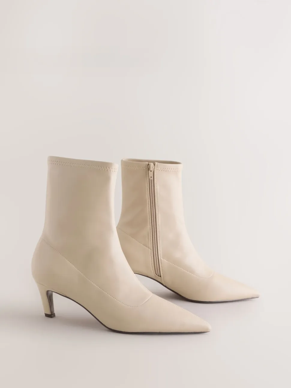 Cream Forever Comfort® Pointed Toe Sock Boots