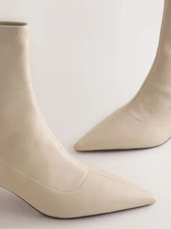 Cream Forever Comfort® Pointed Toe Sock Boots