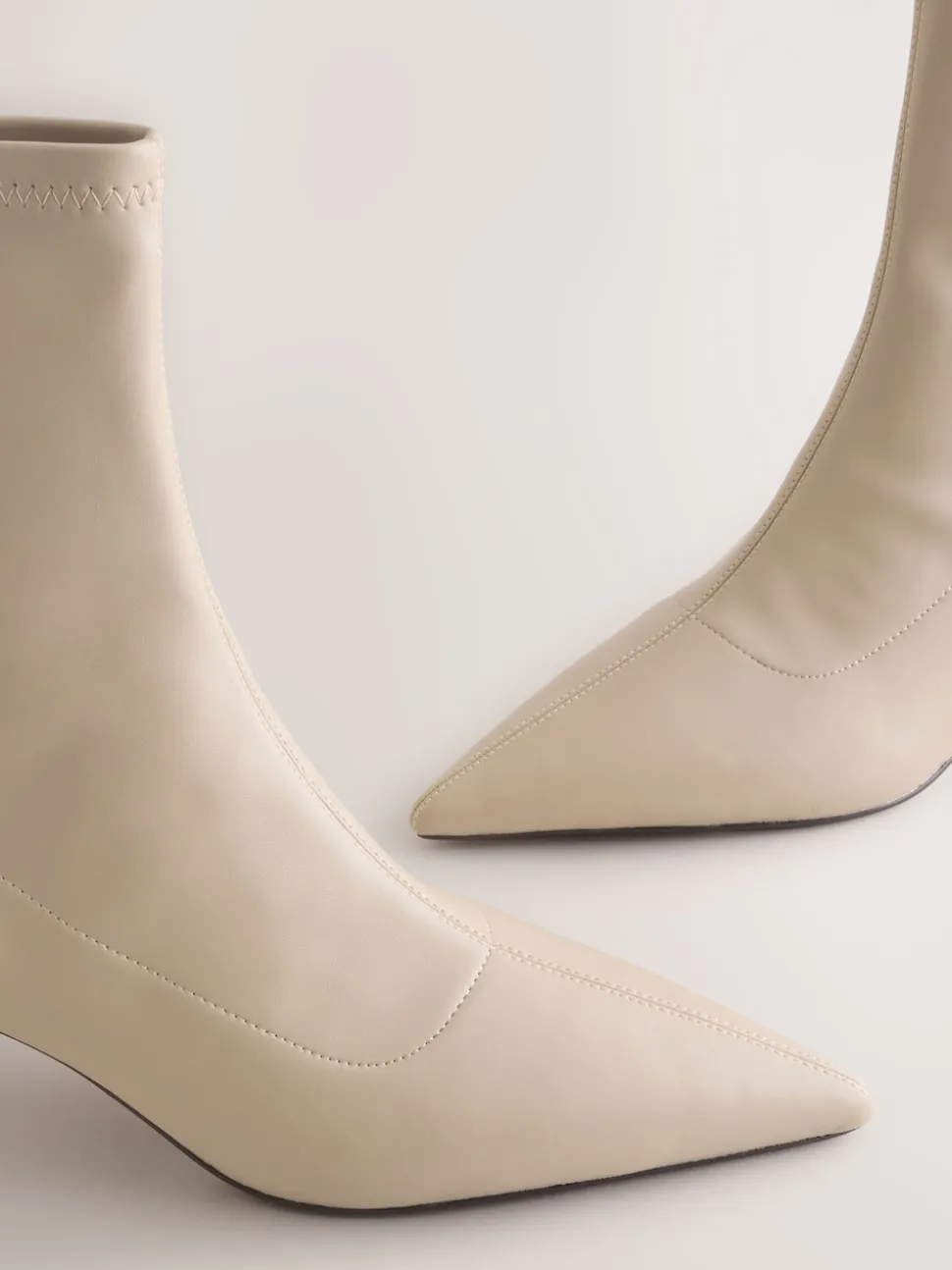 Cream Forever Comfort® Pointed Toe Sock Boots