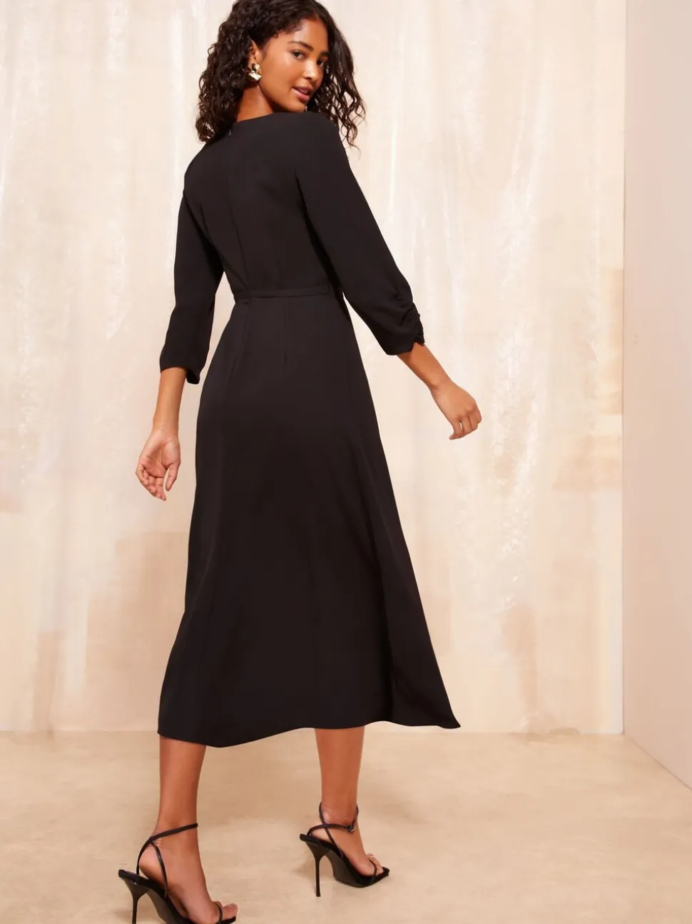Friends Like These Black Tulip Sleeve Belted Flute Hem Dress