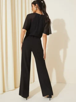 Friends Like These Black Chiffon Flutter Sleeve Scuba Jumpsuit