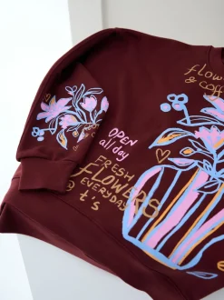Here for the T Brown Floral Vase Graphic Oversized Crew Neck Sweatshirt