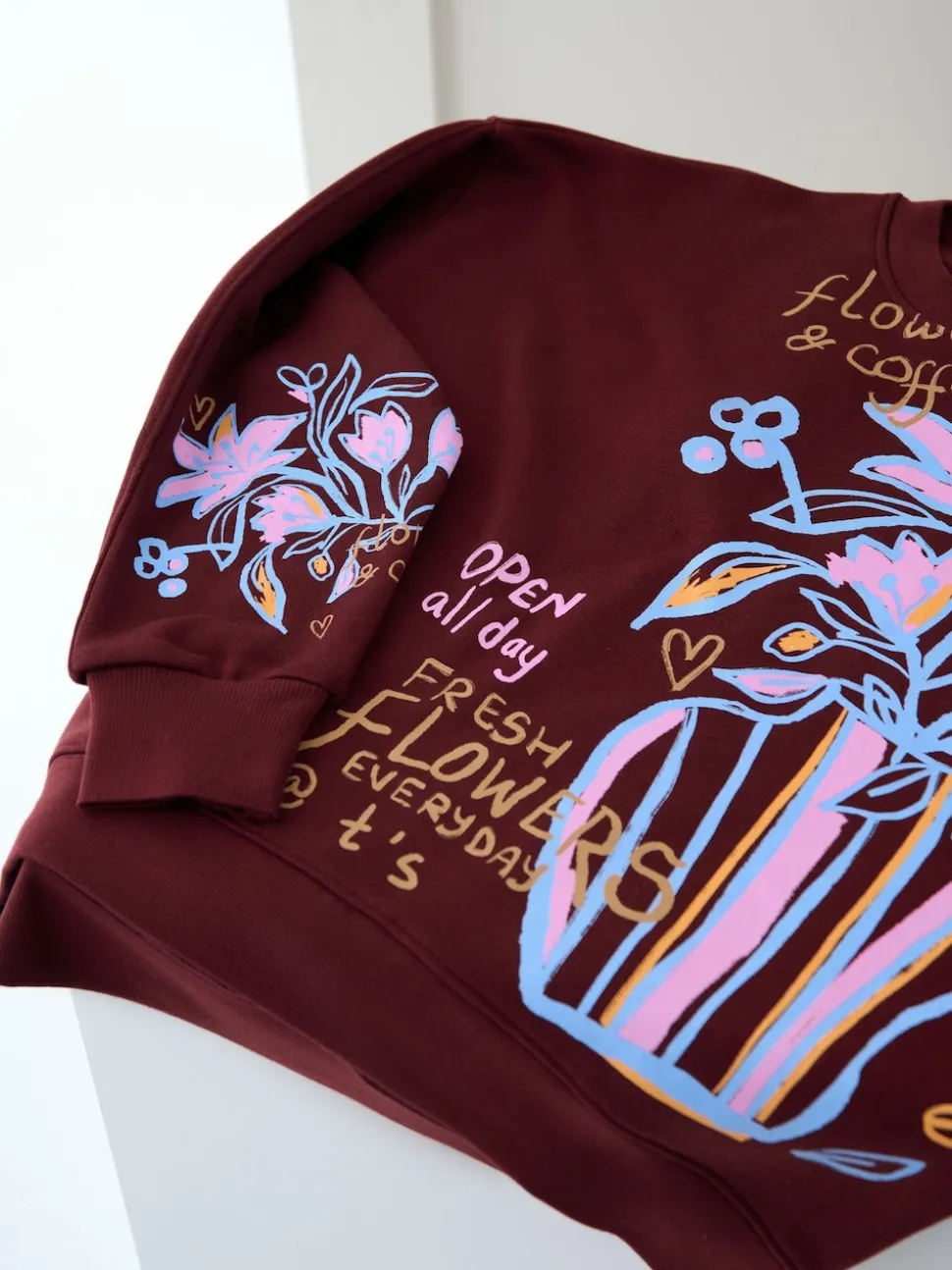 Here for the T Brown Floral Vase Graphic Oversized Crew Neck Sweatshirt
