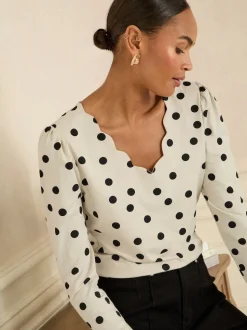 Love & Roses Ivory and Black Spot Print Scallop V-Neck Long Sleeve Jersey Top