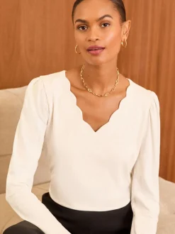 Love & Roses Ivory Scallop V-Neck Long Sleeve Jersey Top