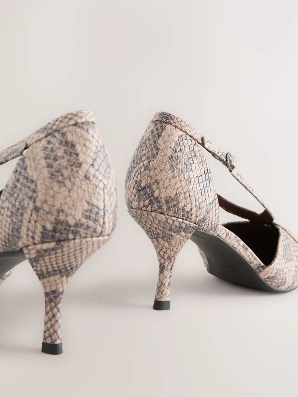 Neutral Snake Forever Comfort® Pointed Toe Strappy Asymmetric Court Heels