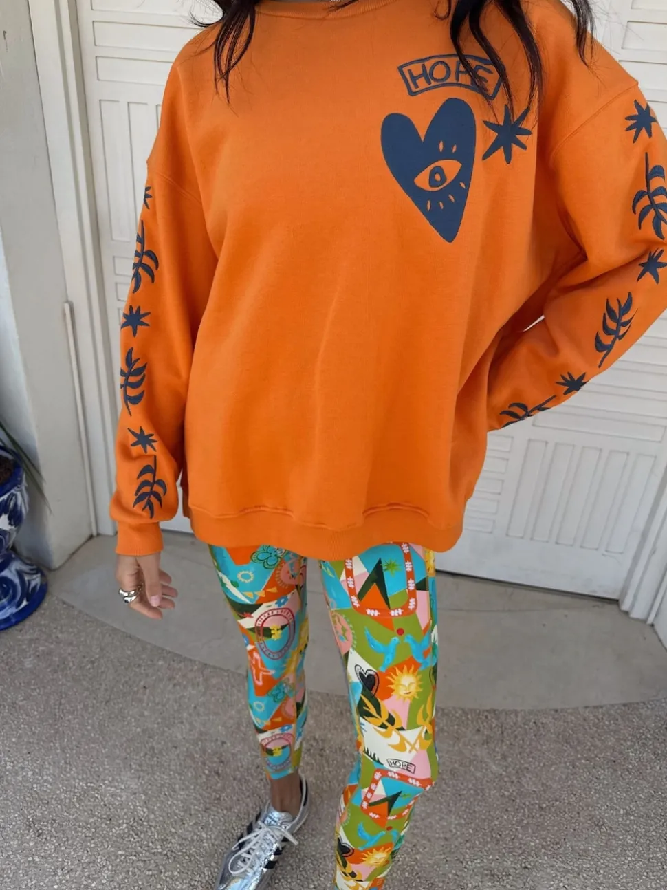Never Fully Dressed Orange Embroidered Sweatshirt