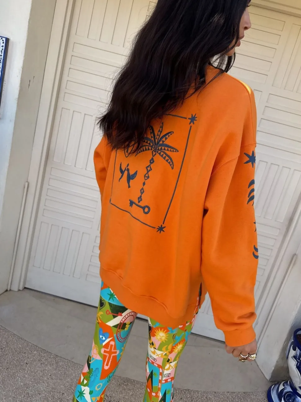 Never Fully Dressed Orange Embroidered Sweatshirt