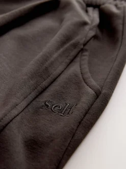 self. Chocolate Brown Barrell Leg Knitted Joggers
