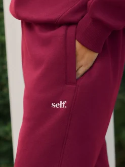 self. Red Cuffed Joggers