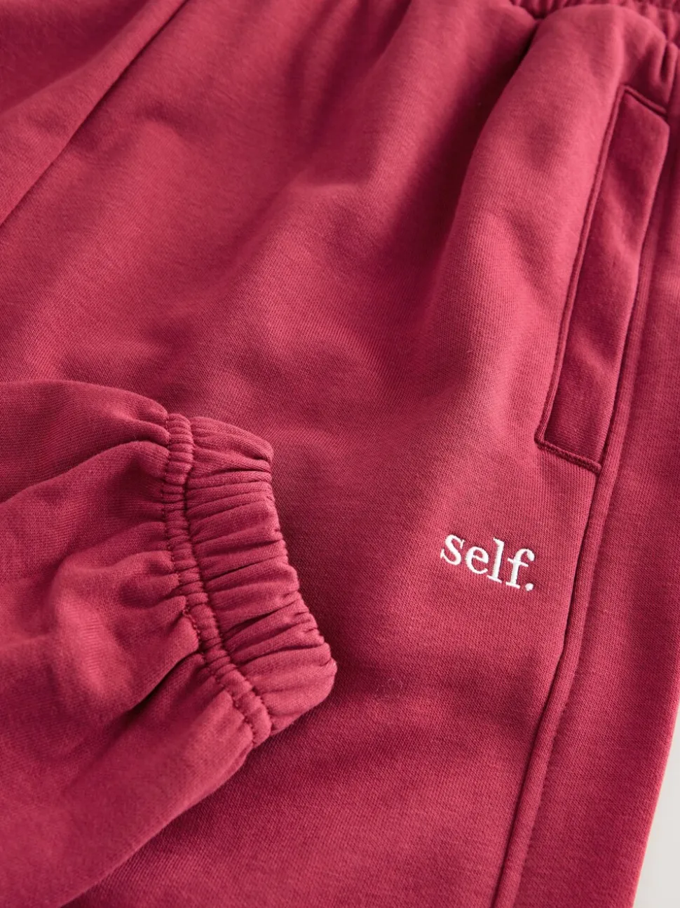 self. Red Cuffed Joggers