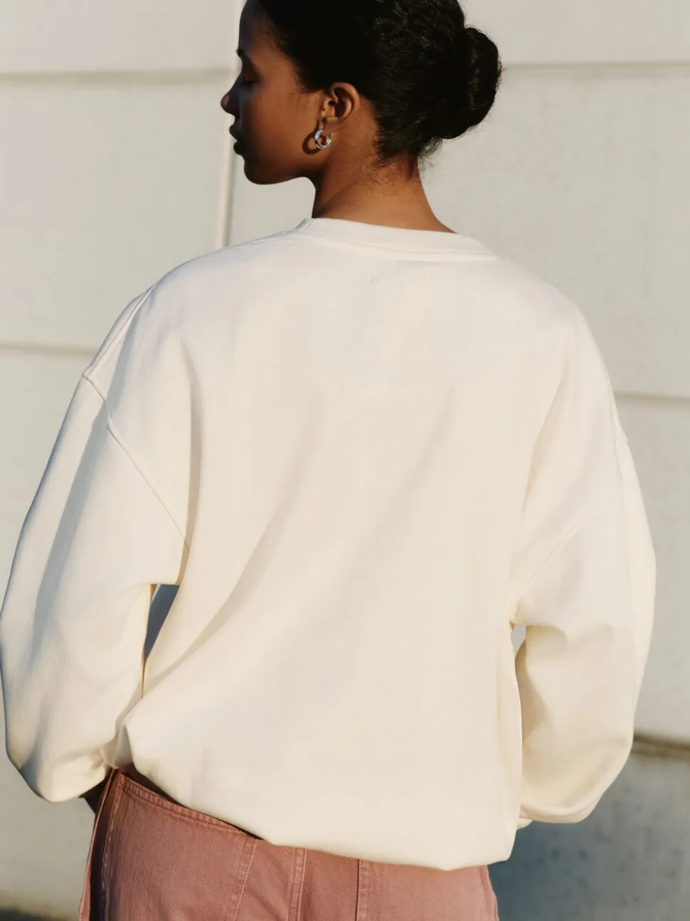 White Sweatshirt with Appliqué Details