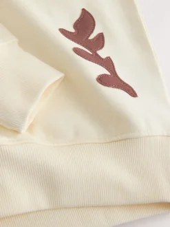 White Sweatshirt with Appliqué Details
